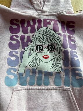 Gildan Light Pink "Swiftie" Graphic Hoodie with Purple & Blue Print